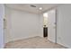 Bedroom featuring wood-look tile flooring and an open doorway to a bathroom at 8130 N 32Nd Dr, Phoenix, AZ 85051