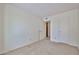 Comfortable carpeted bedroom with a door and closet at 8130 N 32Nd Dr, Phoenix, AZ 85051