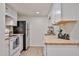 Bright kitchen with white cabinets, butcher block counters, and stainless steel appliances at 8130 N 32Nd Dr, Phoenix, AZ 85051