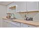 Bright kitchen with white cabinets, butcher block counters, and stainless steel appliances at 8130 N 32Nd Dr, Phoenix, AZ 85051