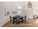 Elegant dining room features high ceilings, modern decor, and plenty of natural light at 9393 E Hunter Ct, Scottsdale, AZ 85262