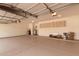 Spacious garage with painted floor and ample storage at 9393 E Hunter Ct, Scottsdale, AZ 85262