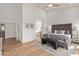 Beautifully designed main bedroom featuring hardwood floors, plush accents, and ample natural light at 9393 E Hunter Ct, Scottsdale, AZ 85262