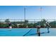 Community tennis court offers residents a great space for exercise and recreation at 9932 E Tumbleweed Ave, Mesa, AZ 85212