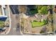 Aerial shot of a putting green with lush turf and desert landscaping in a serene environment at 1 Easy St # 11, Carefree, AZ 85377