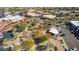 Aerial photo of park and downtown area featuring walking paths, trees, and parking at 1 Easy St # 11, Carefree, AZ 85377