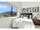 Inviting bedroom featuring a large window with mountain views and a comfortable queen bed at 1 Easy St # 11, Carefree, AZ 85377