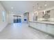 Open-concept living area featuring a fireplace and gourmet kitchen at 1 Easy St # 11, Carefree, AZ 85377