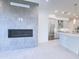 Open living space with fireplace and modern kitchen at 1 Easy St # 11, Carefree, AZ 85377