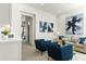 Inviting living room with modern decor, stylish seating, and artistic wall accents at 1 Easy St # 11, Carefree, AZ 85377