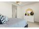 Comfortable bedroom showing a dresser and a door leading to an en-suite bathroom at 1 Easy St # 3, Carefree, AZ 85377