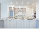 Close-up of kitchen with granite countertops, stainless steel appliances and wooden cabinets at 1 Easy St # 3, Carefree, AZ 85377