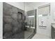 Stylish bathroom with glass-enclosed shower, geometric tile, and luxurious towel storage space at 1 Easy St # 6, Carefree, AZ 85377