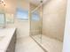 Bright bathroom featuring double vanity and a spacious glass-enclosed shower at 1 Easy St # 6, Carefree, AZ 85377