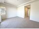 Spacious bedroom featuring plush carpet, ample natural light, and a walk-in closet at 1 Easy St # 6, Carefree, AZ 85377