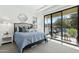 Comfortable bedroom with private balcony, great view, and a calming color palette and plenty of natural light at 1 Easy St # 6, Carefree, AZ 85377