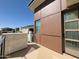 Exterior features metal and rock accents, a walk out door, and overlooks other units in the community at 1 Easy St # 6, Carefree, AZ 85377