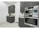 Stylish kitchen with stainless steel appliances, granite countertops, and modern cabinetry at 1 Easy St # 6, Carefree, AZ 85377