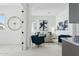 Stylish living room showcasing a neutral color palette, modern art, and a peek of the kitchen at 1 Easy St # 6, Carefree, AZ 85377