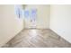 Bright room featuring stylish herringbone-patterned floors and a glass door at 1 Easy St # 6, Carefree, AZ 85377