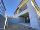 Home's outdoor space features a covered patio, gravel landscaping, and a second-story balcony at 1 Easy St # 7, Carefree, AZ 85377