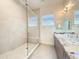 Bright bathroom features a walk-in shower and a double vanity with granite countertops at 1 Easy St # 7, Carefree, AZ 85377