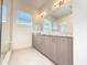 Bright bathroom features a walk-in shower and a double vanity with granite countertops at 1 Easy St # 7, Carefree, AZ 85377