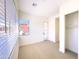 Bright bedroom features a large window, neutral carpet, and closet, creating a serene retreat at 1 Easy St # 7, Carefree, AZ 85377