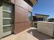 Modern home featuring unique exterior design with stone accents and a private patio at 1 Easy St # 7, Carefree, AZ 85377