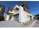 Contemporary two-story home with a glass garage door and stone accents at 1 Easy St # 7, Carefree, AZ 85377