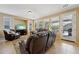 Bright living room with a comfortable leather sofa and abundant natural light at 12915 W Lone Tree Trl, Peoria, AZ 85383