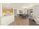 Bright dining area off the kitchen with an open sliding door to a backyard patio at 16100 W Galleria Ln, Surprise, AZ 85374