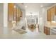 Bright kitchen with white countertops, oak cabinets, and adjacent breakfast nook at 16100 W Galleria Ln, Surprise, AZ 85374