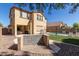 Beautiful backyard features an outdoor kitchen space, patio, and a sparkling pool for relaxing and entertaining at 17975 W Agave Rd, Goodyear, AZ 85338