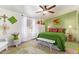 Serene bedroom featuring a comfortable bed and a bright color scheme at 201 S Greenfield Rd # 65, Mesa, AZ 85206