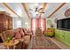 Comfortable living room featuring wood beam ceiling and stylish furnishings at 201 S Greenfield Rd # 65, Mesa, AZ 85206