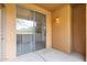 Private patio area with a glass sliding door to the interior at 20100 N 78Th Pl # 1013, Scottsdale, AZ 85255