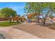 Community playground area with shade structures, play equipment, and green space at 21655 N Davis Way, Maricopa, AZ 85138