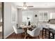 Cozy dining space featuring a modern chandelier, sleek chairs, and plenty of natural light at 220 W Wood Dr, Chandler, AZ 85248