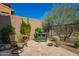 Secluded backyard patio with a built-in barbecue, creating an ideal outdoor cooking space at 23133 N 73Rd Pl, Scottsdale, AZ 85255