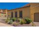 Charming single-story home with a terracotta roof, desert landscaping, and well-maintained curb appeal at 23133 N 73Rd Pl, Scottsdale, AZ 85255