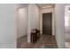 Bright and inviting entryway with neutral paint, decorative tile flooring, and a view of the main hall at 23133 N 73Rd Pl, Scottsdale, AZ 85255