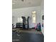 Well-equipped community gym, perfect for fitness enthusiasts with various machines, weights, and workout accessories at 23133 N 73Rd Pl, Scottsdale, AZ 85255