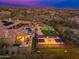 Expansive backyard with pool, sport court, putting green, and outdoor entertainment at 27632 N 68Th Pl, Scottsdale, AZ 85266