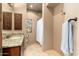 Bathroom featuring granite countertops, cabinets, and a combined shower and bath at 27632 N 68Th Pl, Scottsdale, AZ 85266