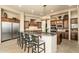 Gourmet kitchen with stainless steel appliances, custom cabinetry, and a large island at 27632 N 68Th Pl, Scottsdale, AZ 85266