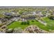 Birds-eye view showcasing the club house surrounded by lush greenery and palm trees at 27792 N 129Th Ln, Peoria, AZ 85383