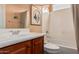 Well-lit bathroom with a modern vanity, sink, and a shower-tub combination at 27792 N 129Th Ln, Peoria, AZ 85383