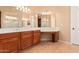 Main bathroom features tile floors, built-in vanity, and neutral walls at 27792 N 129Th Ln, Peoria, AZ 85383