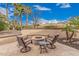 Outdoor fire pit area surrounded by seating, ideal for evening gatherings and relaxation at 27792 N 129Th Ln, Peoria, AZ 85383